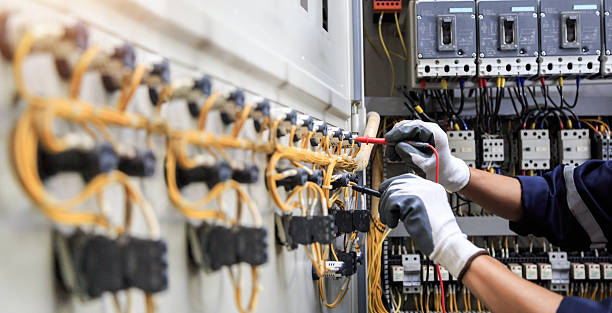 Professional Electrician technician working in Peaceful Valley, WA